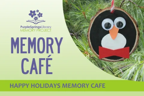 ornament made with a wood slice that looks like a penguin
