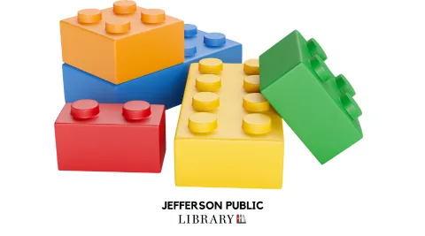 Five LEGO bricks; one red, one blue, one orange, one yellow and one green
